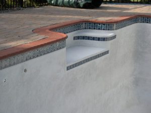 Pool Renovation with Red Brick Safety Grip Coping